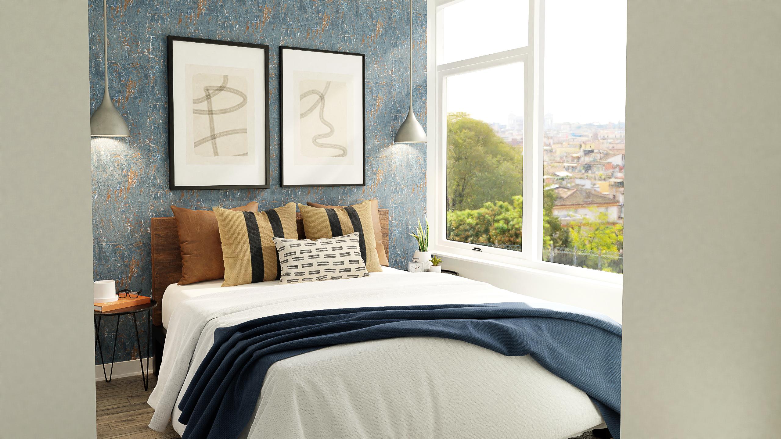 A Modern Industrial Bedroom With Navy Accents