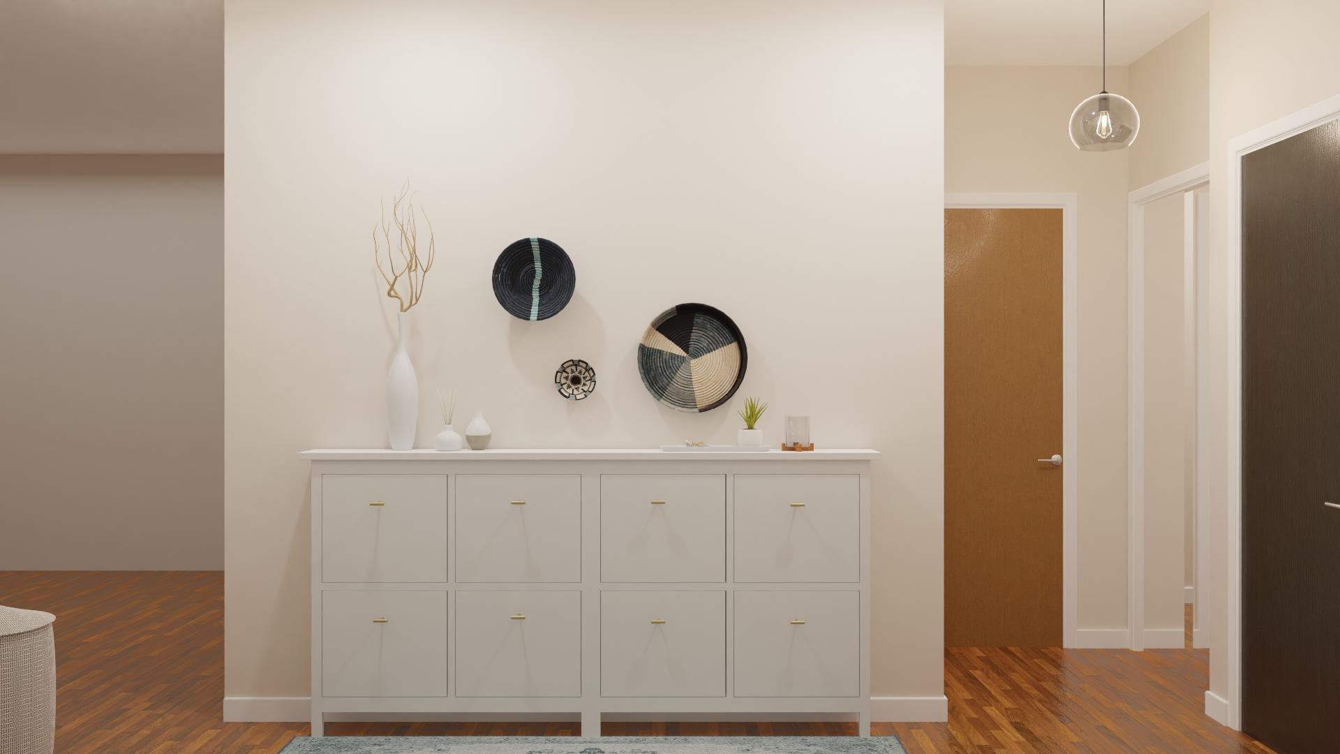A Narrow Entryway With Coastal Décor 